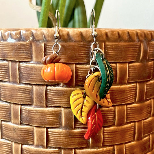 Lee's Art Studio pumpkin and fall color leaves asymmetric polymer clay earrings full view