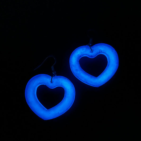 Lee's Art Studio glow in the dark view of purple heart resin earrings