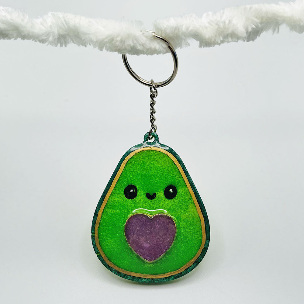 Lees Art Studio avocado with pink mica heart resin keychain