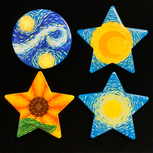 Decorative coasters with starry night design, sunflower, and blue and yellow stars on a black background.