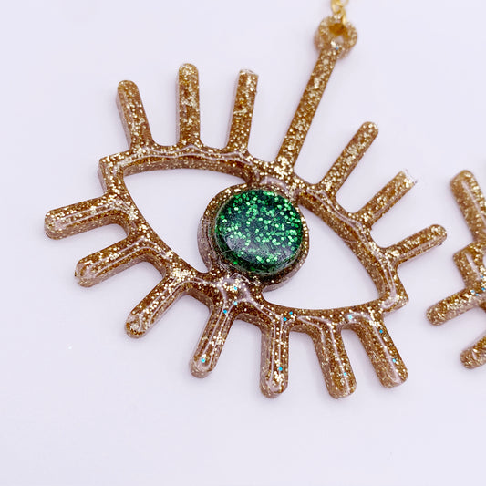 Lee's Art Studio beautiful wide green eyes and gold glitter resin long earring