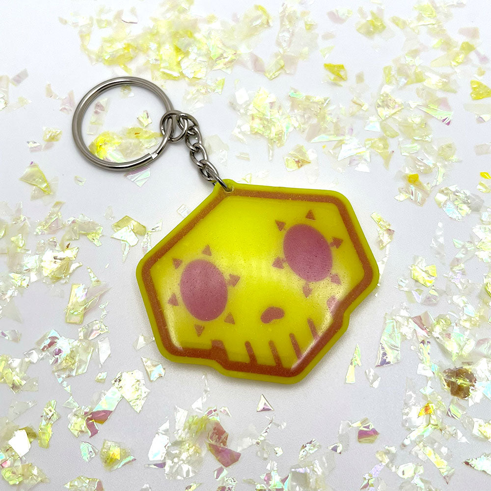 Lee's Art Studio funky glow in the dark skull resin keychain