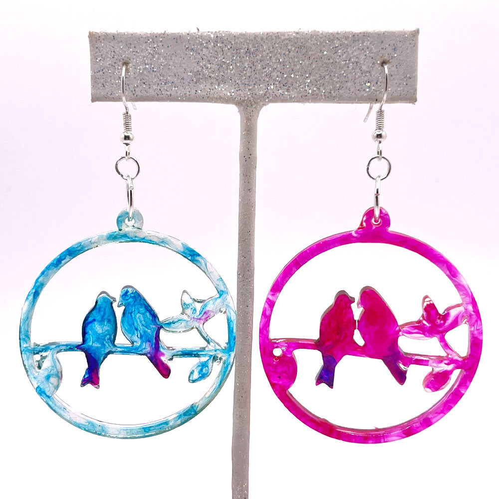 Lees Art studio magenta and blue lovebirds on a branch resin earrings